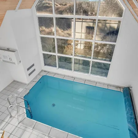 Holiday home Lovely In